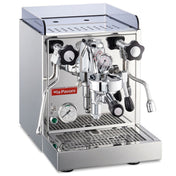 La Pavoni Cellini Classic Traditional Model espresso machine featuring polished stainless steel construction with professional-grade dual pressure gauges, chrome-plated group head, cup warming tray, and articulating steam wand on a sleek countertop design